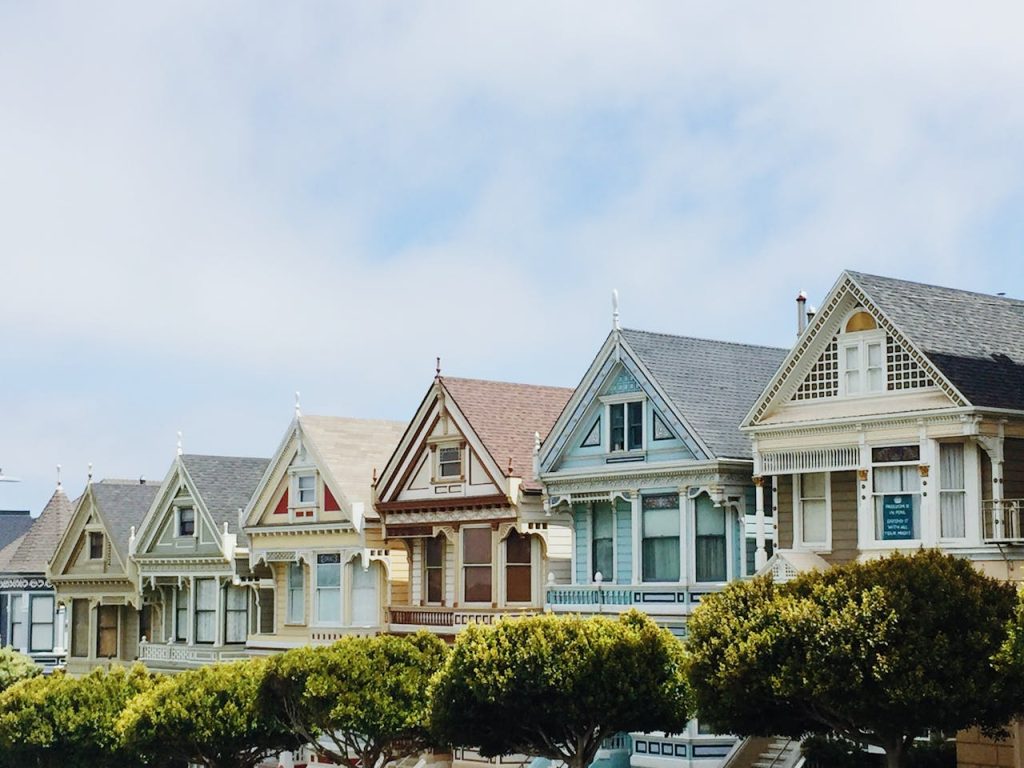 assorted-color-wall-paint-house-photo-1370704 Iconic Painted Ladies Victorian houses in San Francisco with clear blue skies.